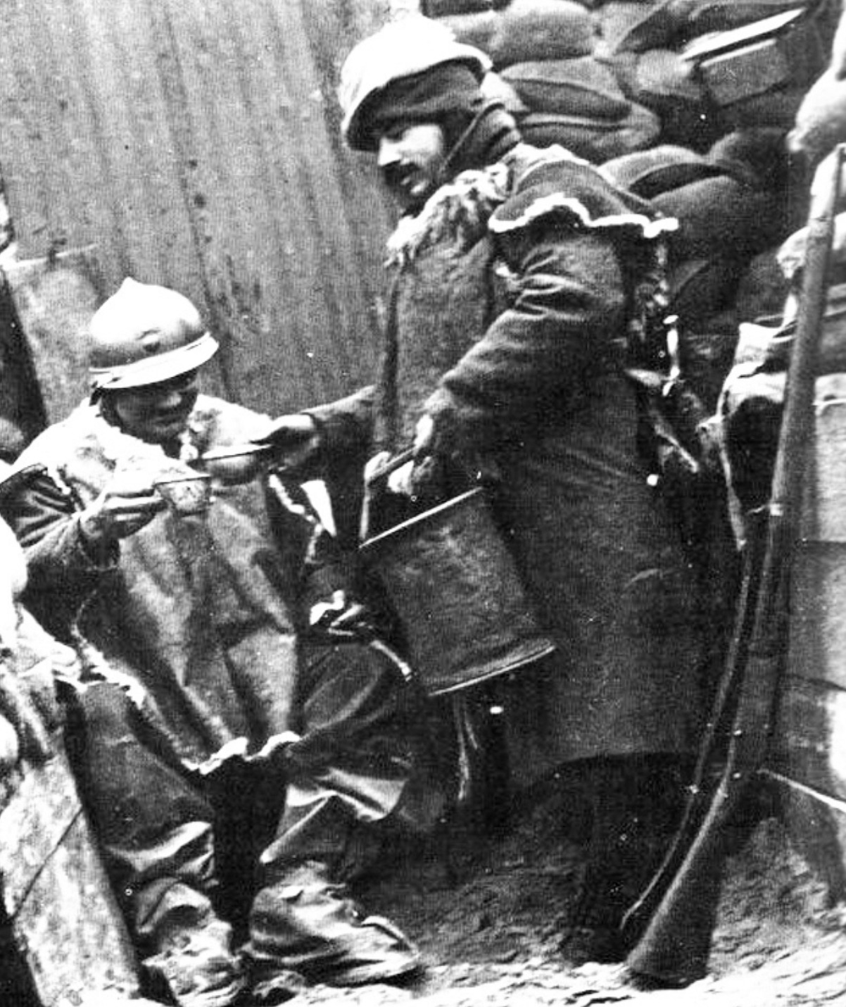 Distribution of pinard, or ration wine, in a French trench in winter 